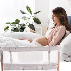 Little Dove Baby Bassinet Bedside Sleeper With Wheels Storage Basket Canopy 3 Hanging Toys Newborn Cosleeping Cribs For Infant Wooden Crib Adjustable Boy Girl Multi-Functional Bedside Sleeper -Delta Children Shop 4117dEESmBL