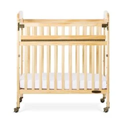 Child Craft Avery SafeAccess Portable Compact Wood Daycare Crib With Casters -Delta Children Shop 41V7FUovc7L