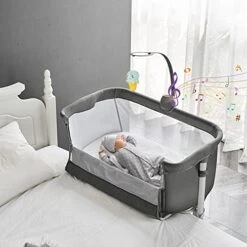Yacul Baby Bassinet, Bedside Crib Sleeper With Wheels And Music Box, Height Adjustable Fit For Bed Height 19" - 26.5", Portable, Dark Gray -Delta Children Shop 41ocIsqO8WL