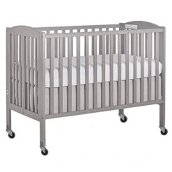 Dream On Me Folding Full Size Convenience Crib In Natural, Two Adjustable Mattress Height Positions, Comes With Heavy Duty Locking Wheels, Flat Folding -Delta Children Shop 41zf3fkoUyL