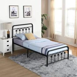 Twin Size Bed Frame With Wooden Headboard And Footboard, Mattress Foundation/Platform With Strong Metal Slats And Anti-Slip Support, No Box Spring Needed/Noise Free, Metal Wood Head Board -Delta Children Shop 517gKZsfoaL. AC