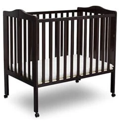 Delta Children Folding Portable Mini Baby Crib With 1.5-inch Mattress - Greenguard Gold Certified, Dark Chocolate