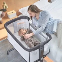 QUTANIX Baby Bassinet Bedside Sleeper With Wheels,Easy Folding Lightweight Crib For Baby/Infants,Breathable Mesh And Adjustable Height - Grey -Delta Children Shop 51NOIjgfs9L. AC
